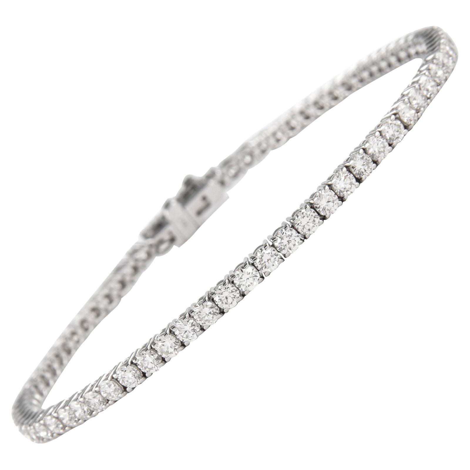Diamond Tennis Bracelet 3.91ct D-F Round Cut in 18k White Gold 7 Inch: Diamond Tennis Bracelet 3.91ct D-F Round Cut in 18k White Gold 7 Inch This exquisite tennis bracelet features 65 round brilliant diamonds totaling 3.91 carats, with D-F color and SI1/SI2 clarity. The