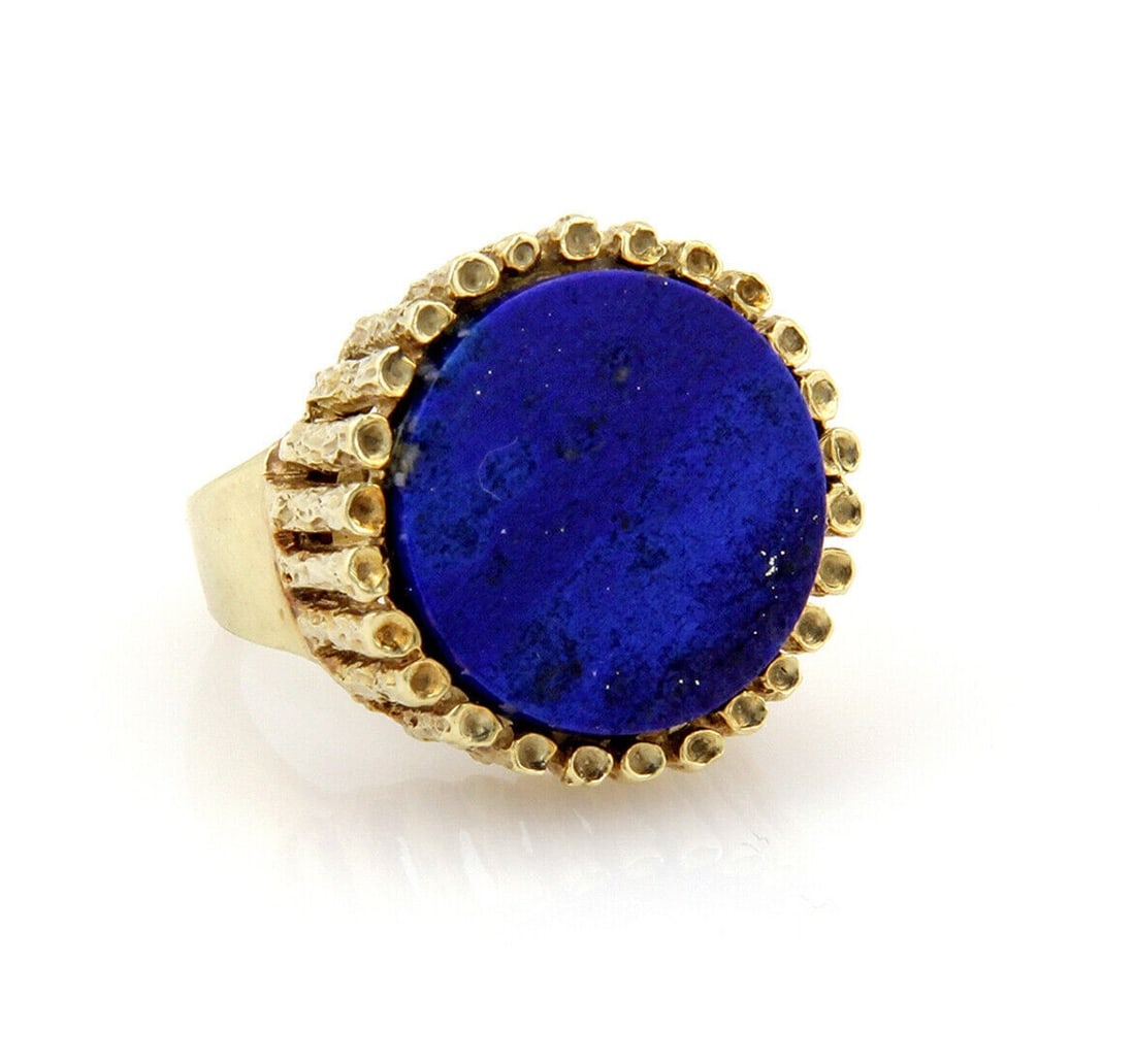 Textured 14k Yellow Gold Lapis Ring Round Design Size 9.5: Textured 14k Yellow Gold Lapis Ring Round Design Size 9.5 This ring showcases a striking 20mm round lapis gemstone set in a textured solid 14k yellow gold band. Designed in a vintage-inspired style, t
