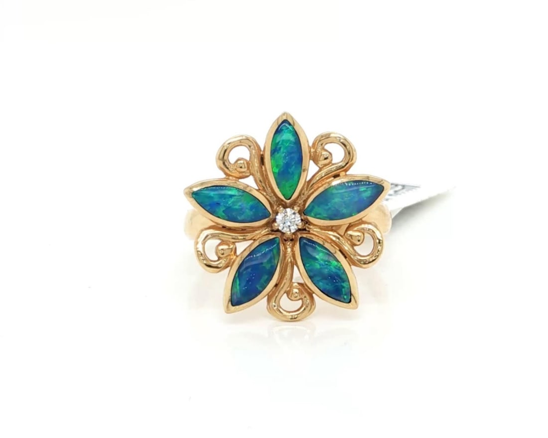 14k Yellow Gold Kabana Fire Opal and Diamond Floral Ring Size 7.5: 14k Yellow Gold Kabana Fire Opal and Diamond Floral Ring Size 7.5 This Kabana Fire Opal and Diamond Flower Ring is crafted in 14k yellow gold, featuring a vibrant fire opal gemstone accented by an app