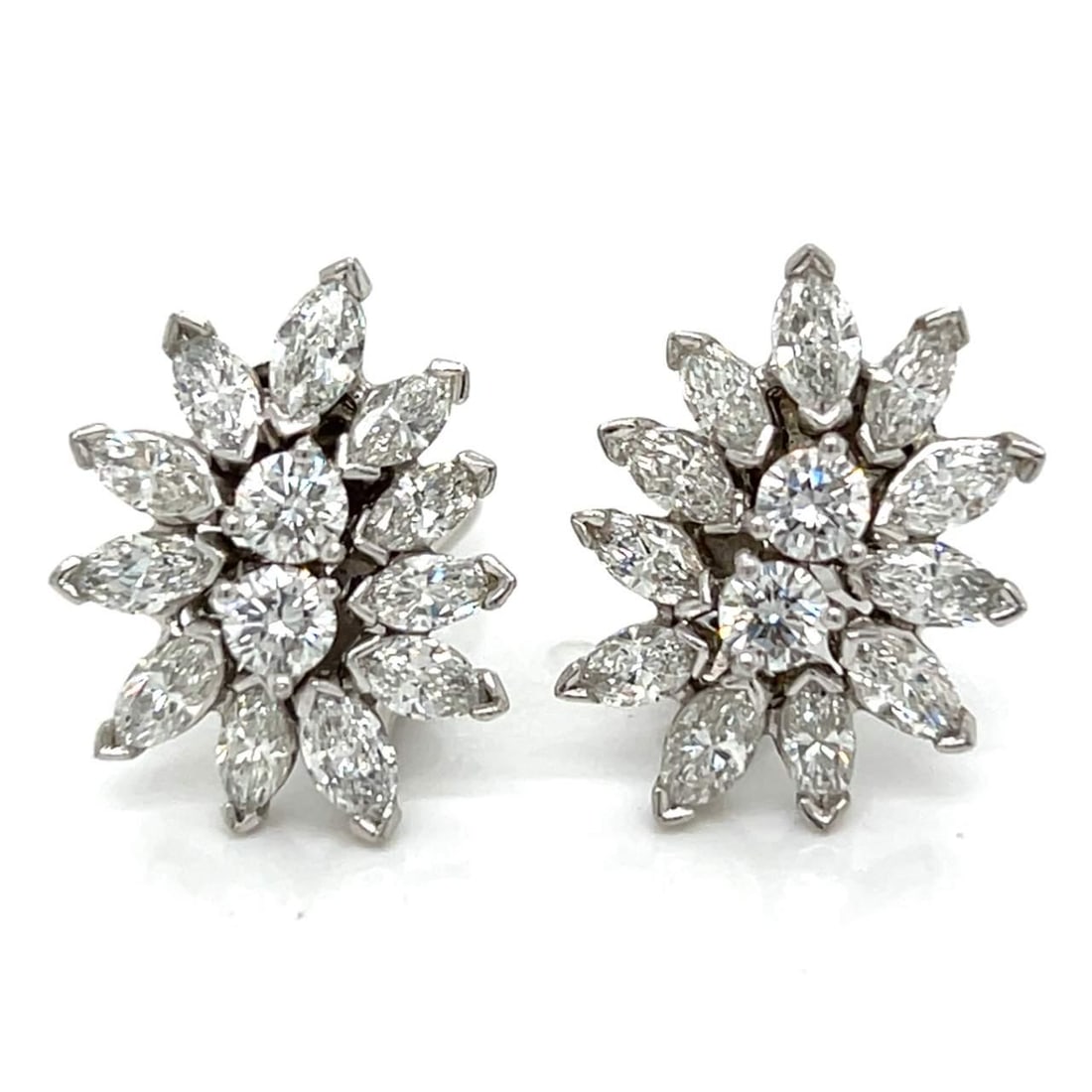 1960's Platinum Diamond Earrings 4.80 Ct G-H VVS-VS Vintage: 1960's Platinum Diamond Earrings 4.80 Ct G-H VVS-VS Vintage Elevate your elegance with these stunning 1960's platinum diamond earrings. Featuring a total diamond weight of approximately 4.80 ct, these