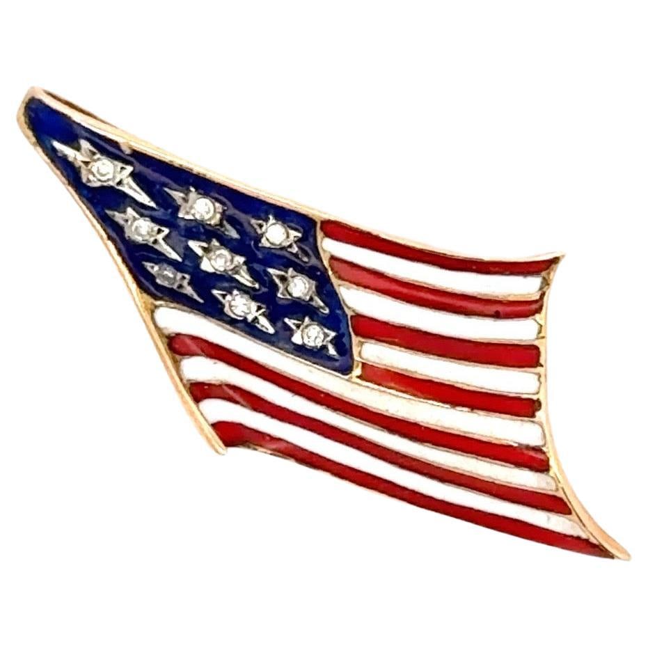 American Flag Pendant Brooch 14K Yellow Gold with Diamonds and Enamel: American Flag Pendant Brooch 14K Yellow Gold with Diamonds and Enamel Celebrate your patriotism with this exquisite American Flag pendant brooch crafted from 14 karat yellow gold. Featuring a stunning