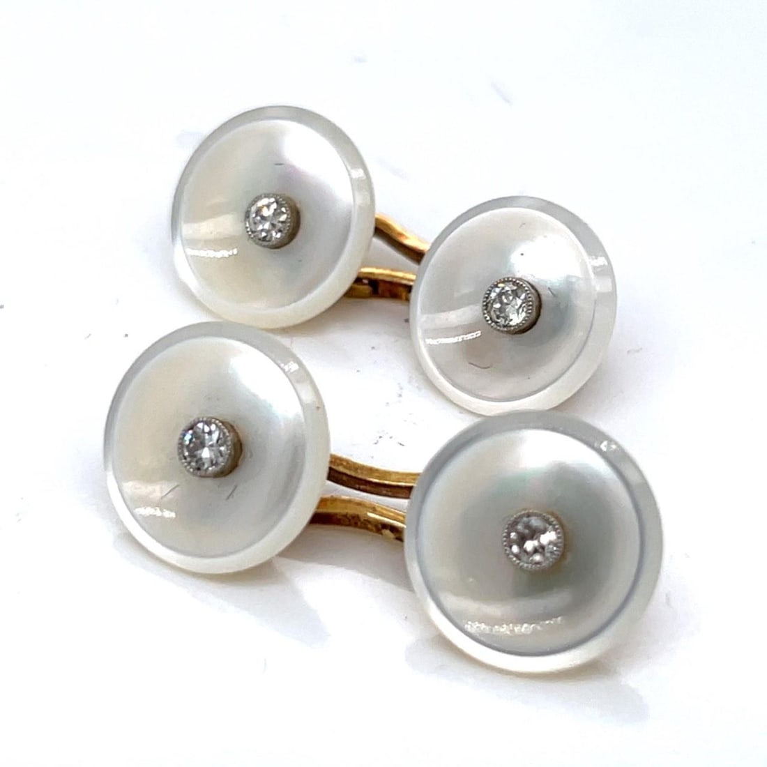 Antique Art Deco 14K Yellow Gold Diamond Mother of Pearl Cufflinks: Antique Art Deco 14K Yellow Gold Diamond Mother of Pearl Cufflinks These exquisite Antique Art Deco cufflinks are crafted from 14K yellow gold and feature stunning mother of pearl inlays. Each cufflin