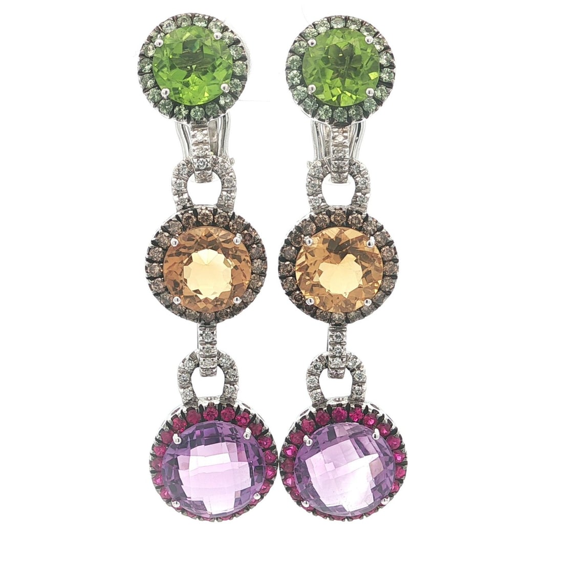 Chandelier Dangle Earrings in 18k White Gold With Ruby Sapphire Amethyst Gemstones: Chandelier Dangle Earrings in 18k White Gold With Ruby Sapphire Amethyst Gemstones These chandelier-style dangle earrings are crafted from solid 18k white gold and feature a vibrant array of natural g