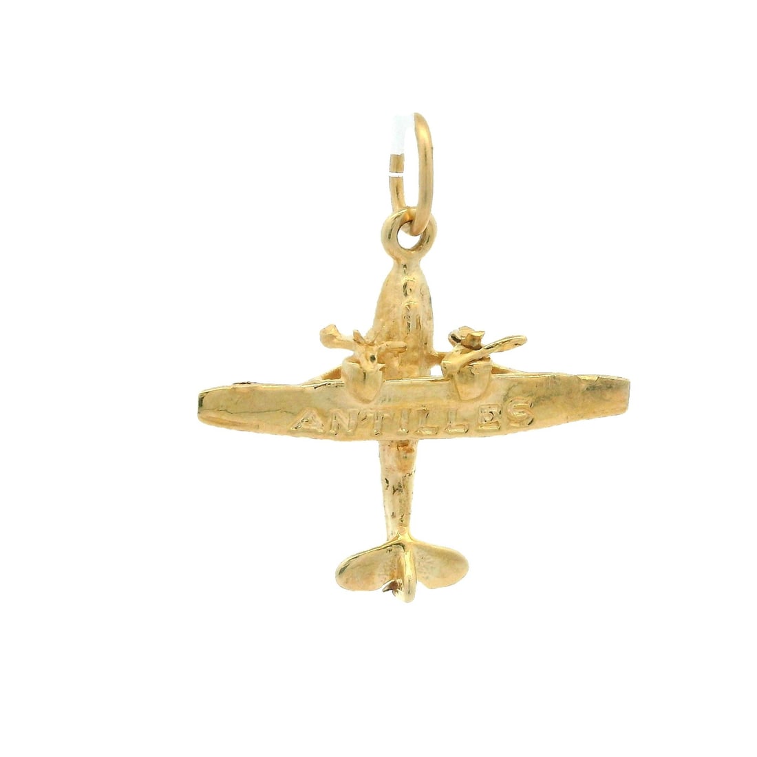 Vintage 14k Yellow Gold Antilles Plane Charm Pendant: Vintage 14k Yellow Gold Antilles Plane Charm Pendant Introducing a vintage charm pendant that captures the spirit of adventure. This exquisite propeller plane charm is crafted from solid 14k yellow go
