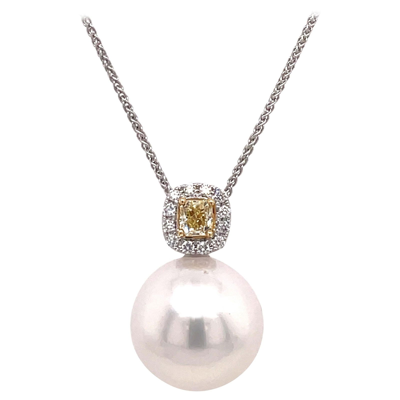 Harbor Diamonds 18K White Gold South Sea Pearl Pendant with Yellow Diamond 0.37 ct: Harbor Diamonds 18K White Gold South Sea Pearl Pendant with Yellow Diamond 0.37 ct This stunning pendant features a beautiful South Sea Pearl measuring 14-15 mm, elegantly set in 18 Karat White Gold.