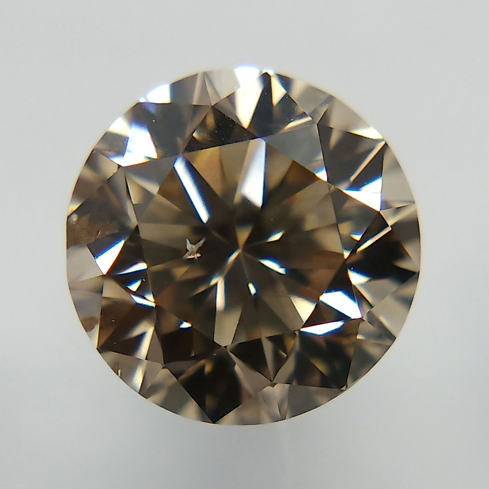 Loose Diamond - ROUND 1.0ct Fancy Yellowish Brown SI2: Loose Diamond - ROUND 1.0ct Fancy Yellowish Brown SI2 Source: Natural Shape: ROUND Carats: 1.0 Color: Fancy Yellowish Brown Certification: EGL PLEASE NOTE: Framed, Large, or heavy items do not have sh
