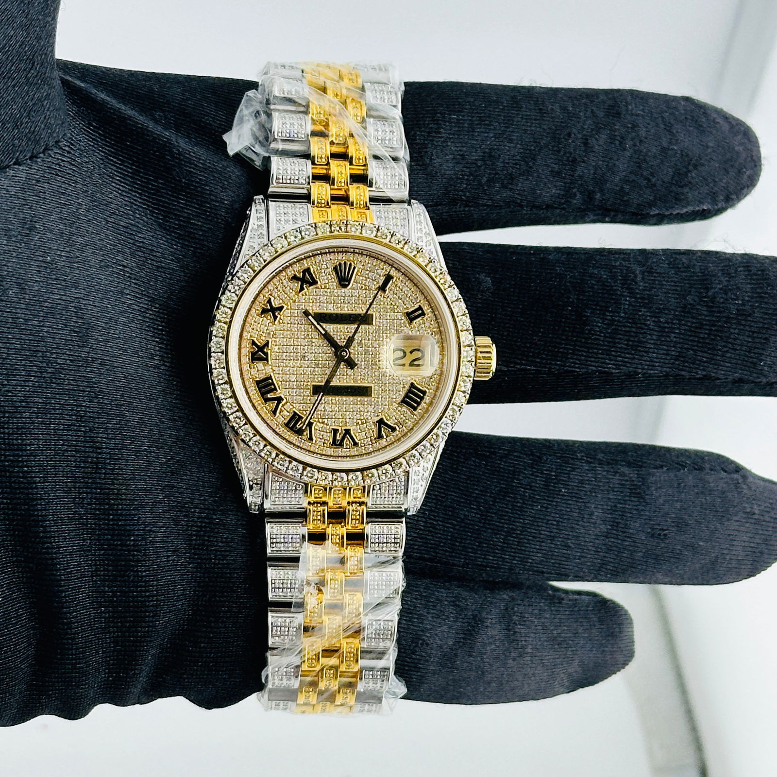 Datejust Ref 1601 Mens Watch Diamond Roman Dial Aftermarket Diamond Bracelet: Datejust Ref 1601 Mens Watch Diamond Roman Dial Aftermarket Diamond Bracelet This Rolex Datejust Ref 1601 features a diamond Roman numeral dial and an aftermarket diamond Jubilee bracelet. The watch i