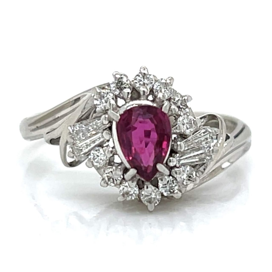 Platinum Ruby 0.59 Ct Diamond Ring 16 Diamonds F-G VS1-SI1: Platinum Ruby 0.59 Ct Diamond Ring 16 Diamonds F-G VS1-SI1 This exquisite platinum ring features a stunning 0.59 Ct. ruby at its center, complemented by 16 sparkling diamonds totaling 0.32 Ct. The dia