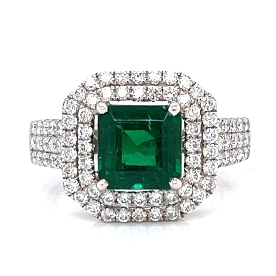 18K GIA Certified 2.94 Ct Emerald Diamond Ring 1.30 Ct Diamonds: 18K GIA Certified 2.94 Ct Emerald Diamond Ring 1.30 Ct Diamonds This stunning 18K gold ring features a GIA Certified 2.94 Ct. emerald at its center, beautifully complemented by approximately 1.30 Ct.
