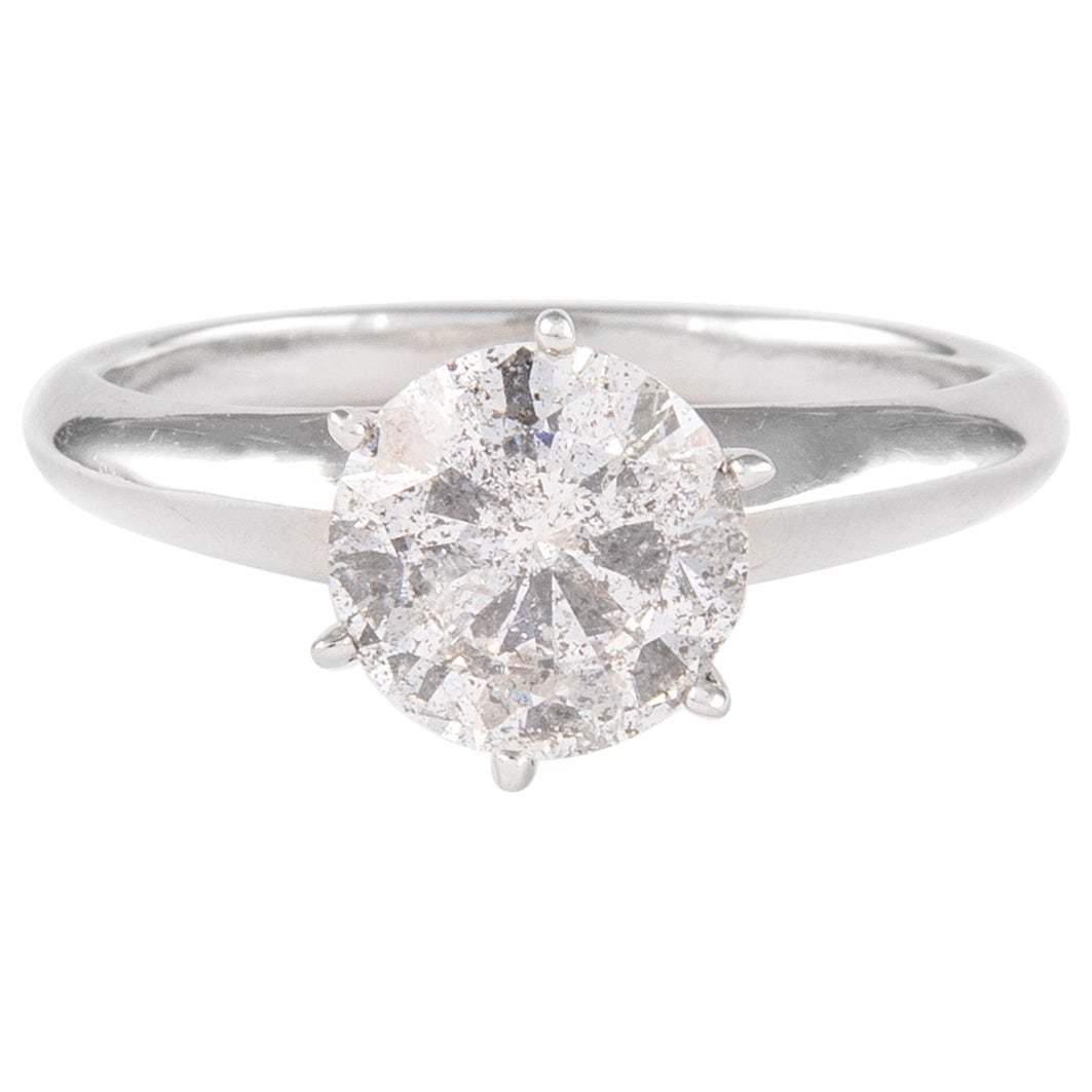 1.68 Carat Round Brilliant Diamond Engagement Ring 18K White Gold GIA Appraised: 1.68 Carat Round Brilliant Diamond Engagement Ring 18K White Gold GIA Appraised This stunning engagement ring features a classic solitaire design with a round brilliant diamond weighing 1.68 carats. C