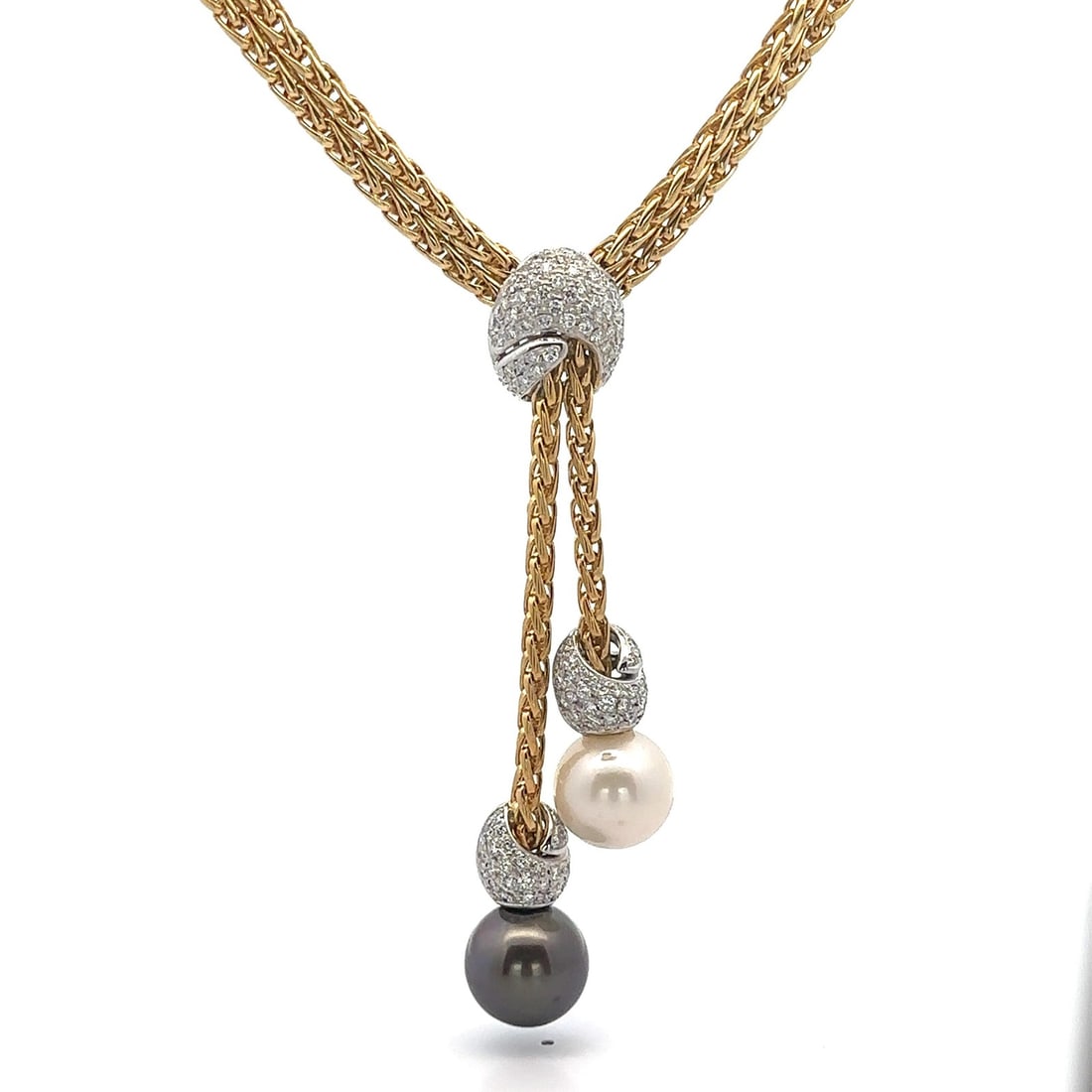 Craig Drake 18k Gold Pearl Diamond Dual Wheat Link Lariat Necklace: Craig Drake 18k Gold Pearl Diamond Dual Wheat Link Lariat Necklace This exquisite Craig Drake necklace features a luxurious combination of 18k yellow and white gold, adorned with natural diamonds and