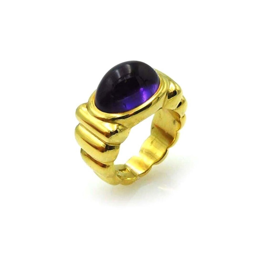 Amethyst Gemstone Ring in 18k Yellow Gold by Elizabeth Rand Size 6: Amethyst Gemstone Ring in 18k Yellow Gold by Elizabeth Rand Size 6 This authentic Elizabeth Rand ring features a striking amethyst gemstone set in solid 18k yellow gold. Showcasing a bold and elegant