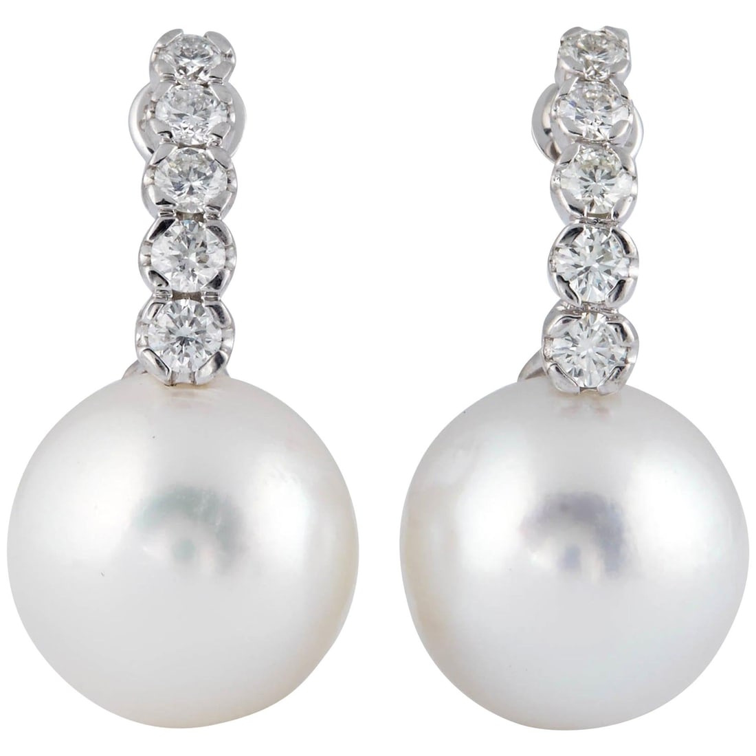 Diamond and South Sea Pearl Drop Earrings in 18k White Gold 13-14mm: Diamond and South Sea Pearl Drop Earrings in 18k White Gold 13-14mm These contemporary drop earrings feature lustrous 13-14 mm South Sea pearls accented by round cut diamonds with a total weight of 0.