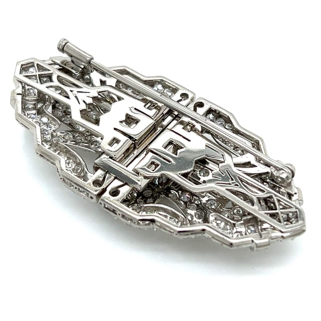 Art Deco Platinum Diamond Brooch 7.40 Ct with 240 Diamonds: Art Deco Platinum Diamond Brooch 7.40 Ct with 240 Diamonds This exquisite Art Deco brooch is crafted in platinum and features a stunning total diamond weight of 7.40 carats. It is adorned with two pro