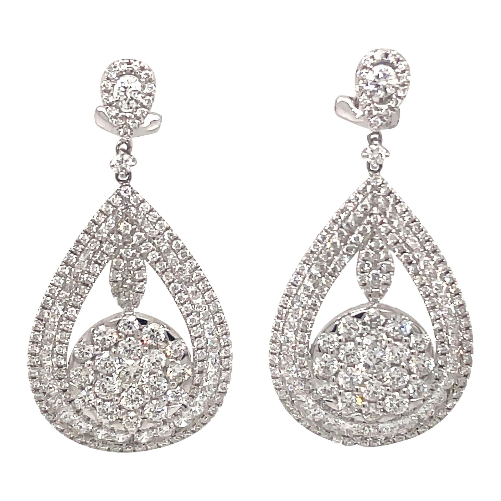 5.74ct Pave Diamond Drop Earrings in 18k White Gold: 5.74ct Pave Diamond Drop Earrings in 18k White Gold Discover these stunning pave diamond drop earrings, elegantly crafted in 18k white gold. Featuring a total weight of 5.74 carats, these earrings are