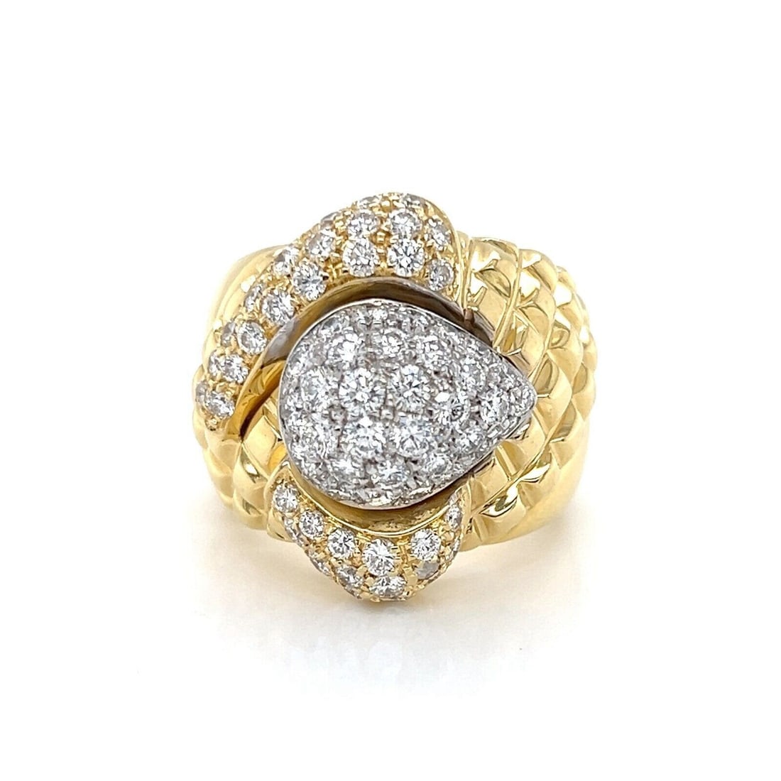 Vintage 18k Two Tone Gold Diamond Statement Ring Size 6.5: Vintage 18k Two Tone Gold Diamond Statement Ring Size 6.5 This vintage ring features an intricate large fancy design crafted from 18k two tone gold. Accented with 0.90 carats of diamonds, it offers a
