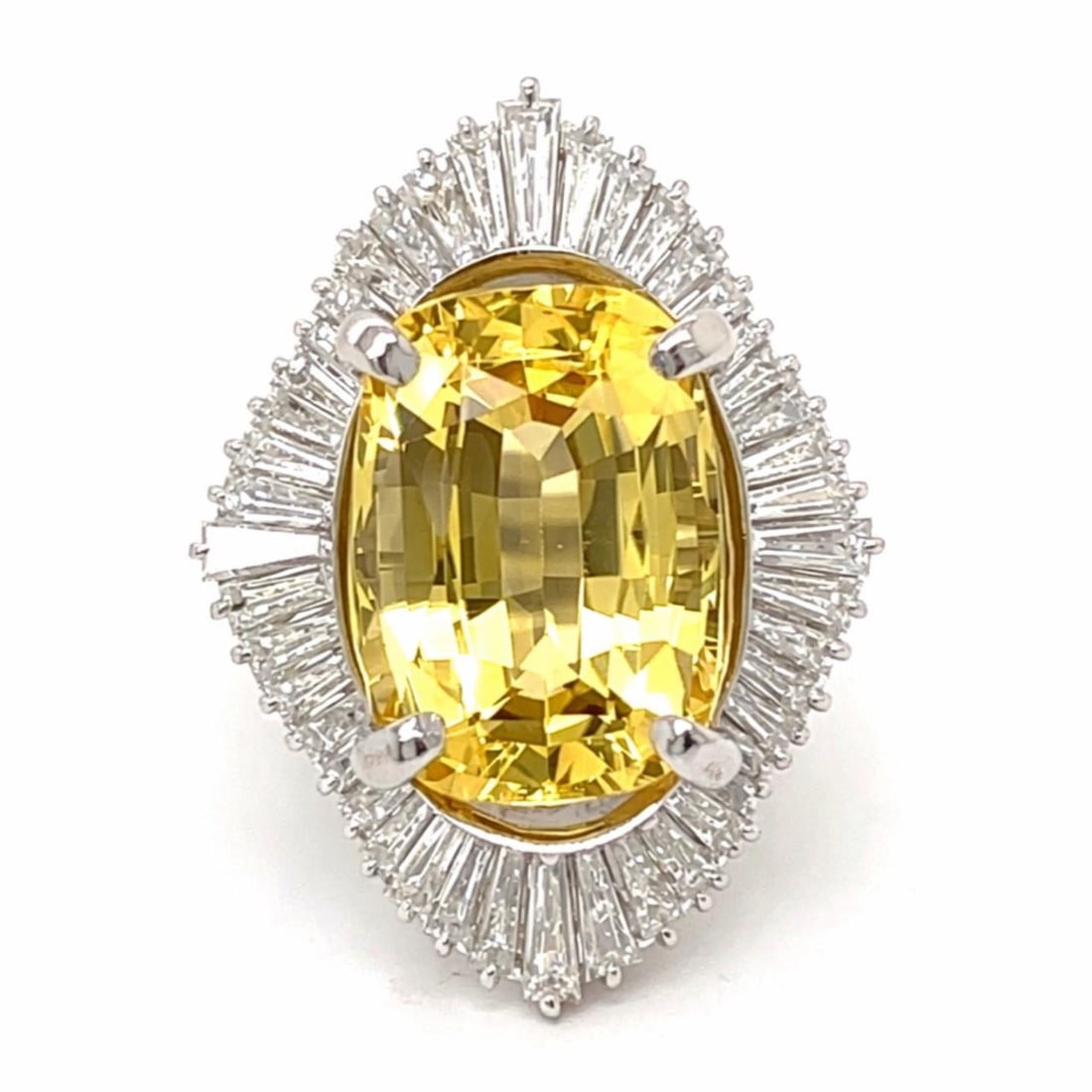 Platinum Ring with 13.68 Ct Ceylon No-Heat Yellow Sapphire and Diamonds GPL Certified: Platinum Ring with 13.68 Ct Ceylon No-Heat Yellow Sapphire and Diamonds GPL Certified This platinum ring showcases a 13.68 carat Ceylon no-heat yellow sapphire, certified by the Gem & Pearl Laboratory
