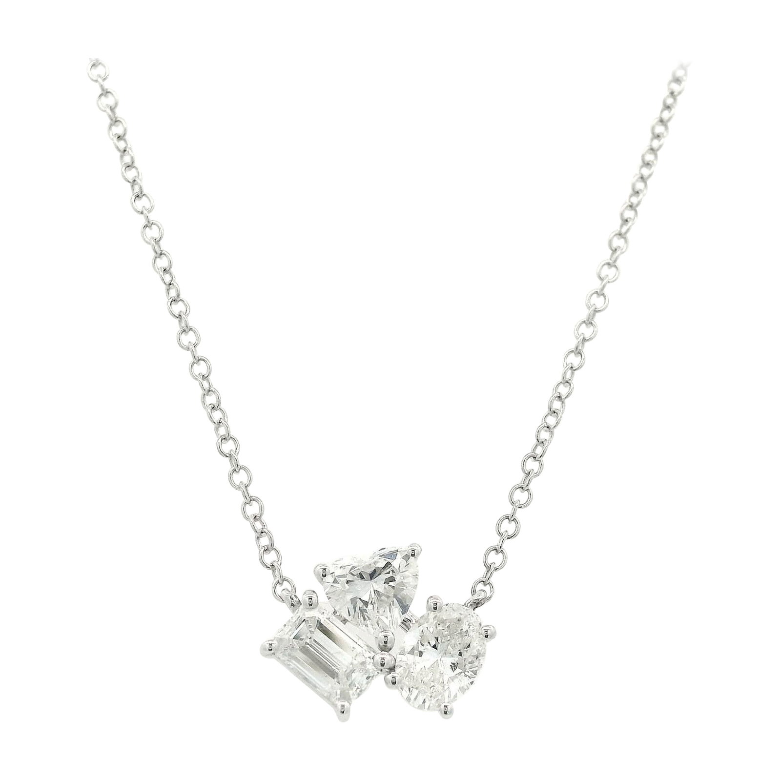1.30ct Mixed Diamond Pendant Necklace 18k White Gold: 1.30ct Mixed Diamond Pendant Necklace 18k White Gold This stunning Mixed Diamond Pendant Necklace showcases a total of 1.30 carats of exquisite diamonds set in luxurious 18k white gold. The necklace f