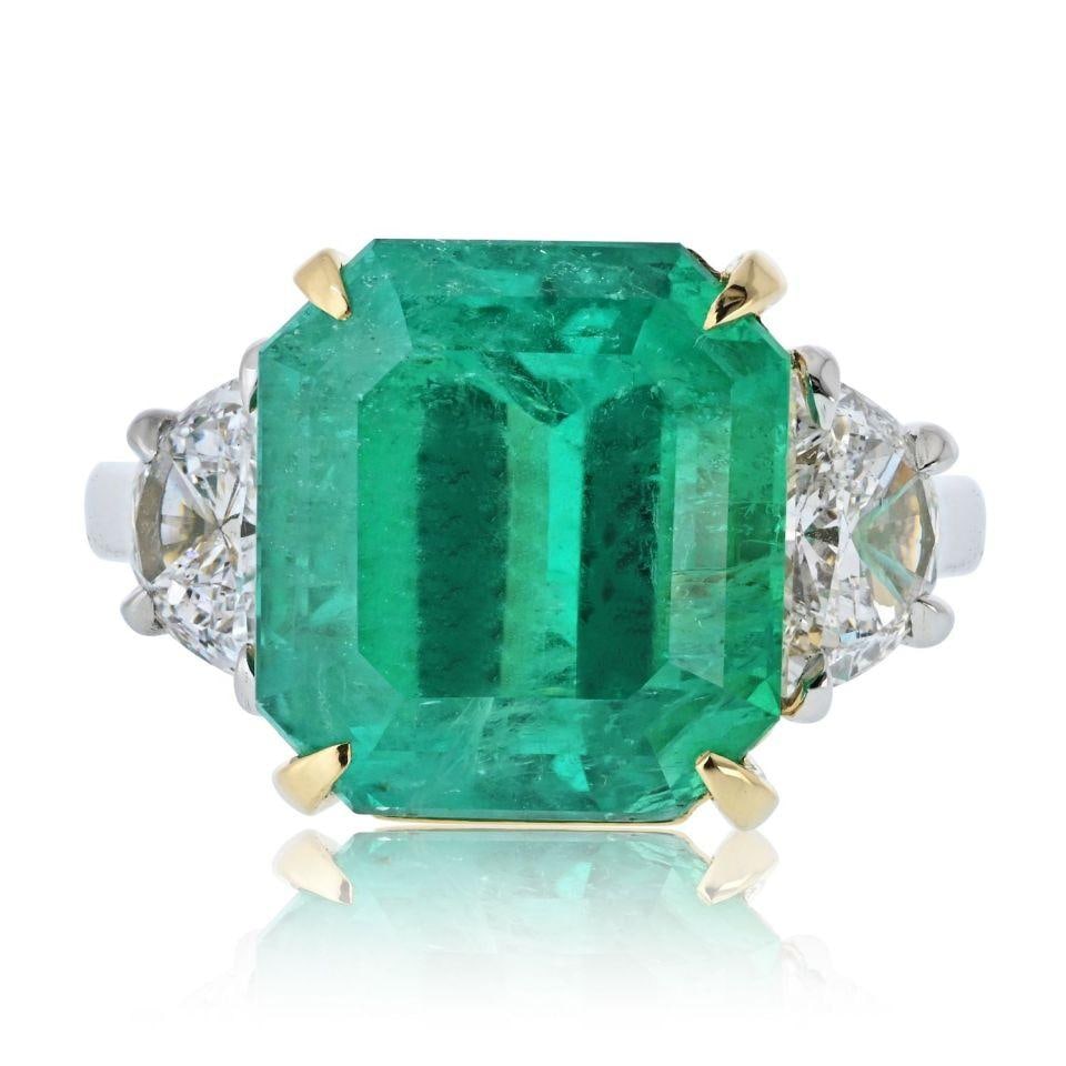 Stunning 10.42ct Colombian Emerald Diamond Ring in Platinum 18K Gold: Stunning 10.42ct Colombian Emerald Diamond Ring in Platinum 18K Gold This exquisite engagement ring features a stunning 10.42-carat natural Colombian emerald, celebrated for its rich green hue and uni