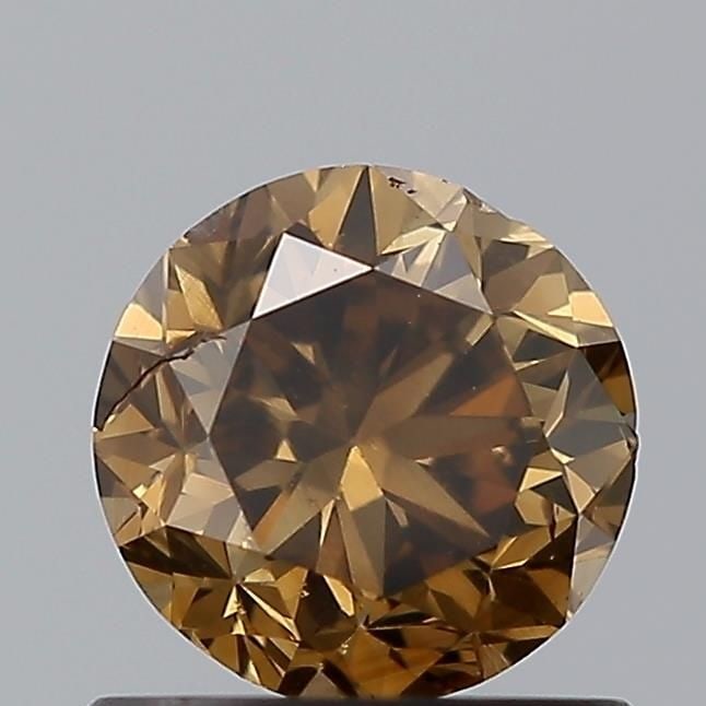 Loose Diamond - ROUND 0.72ct Brown SI1: Loose Diamond - ROUND 0.72ct Brown SI1 Source: Natural Shape: ROUND Carats: 0.72 Color: Brown Certification: NONE Video: