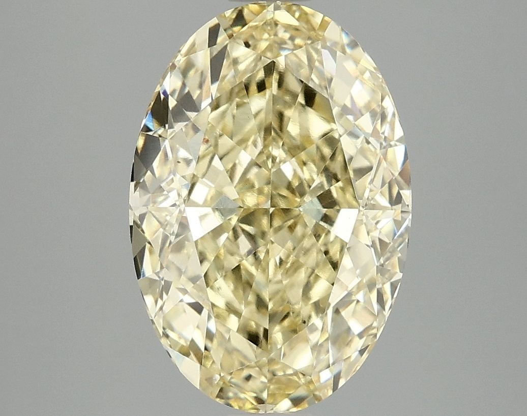 Loose Diamond - OVAL 4.02ct Fancy Vivid Yellow VS1: Loose Diamond - OVAL 4.02ct Fancy Vivid Yellow VS1 Source: This is a real non-mined Diamond that has been grown in a lab Shape: OVAL Carats: 4.02 Color: Fancy Vivid Yellow Certification: IGI Video: