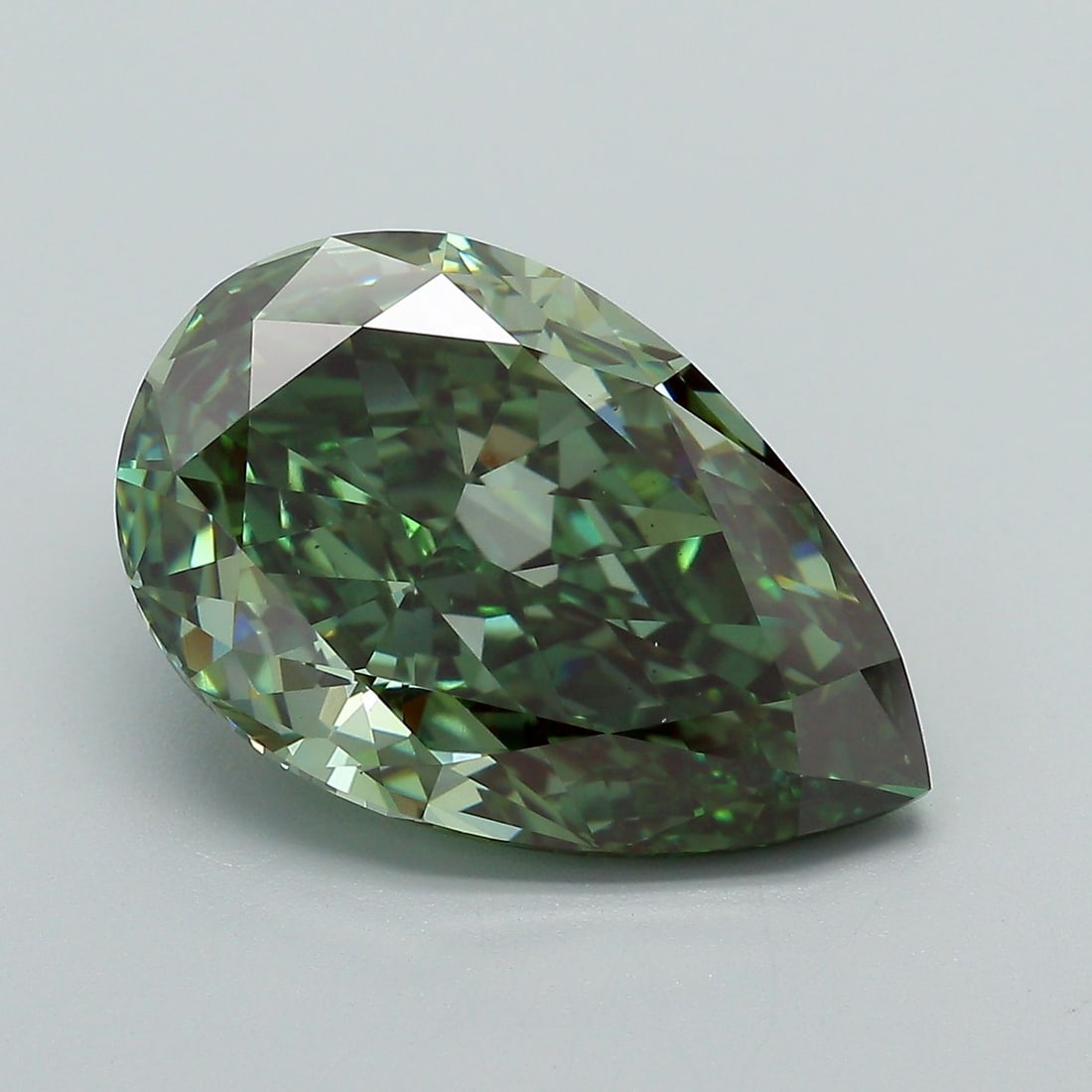 Loose Diamond - PEAR 7.36ct Fancy Vivid Green VS1: Loose Diamond - PEAR 7.36ct Fancy Vivid Green VS1 Source: This is a real non-mined Diamond that has been grown in a lab Shape: PEAR Carats: 7.36 Color: Fancy Vivid Green Certification: IGI Video: