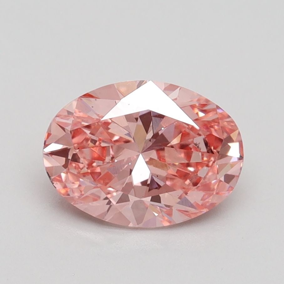 Loose Diamond - OVAL 1.4ct Fancy Vivid Pink VS2: Loose Diamond - OVAL 1.4ct Fancy Vivid Pink VS2 Source: This is a real non-mined Diamond that has been grown in a lab Shape: OVAL Carats: 1.4 Color: Fancy Vivid Pink Certification: IGI Video: