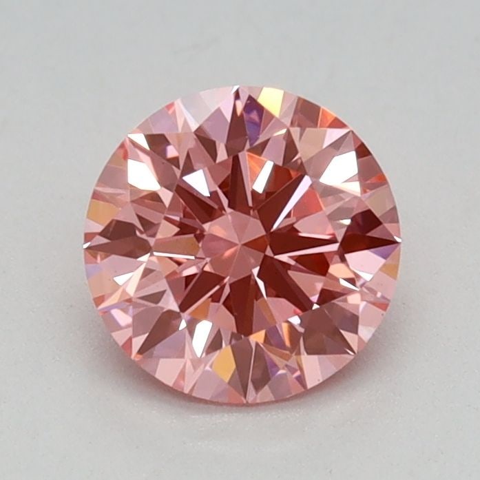 Ideal Loose Diamond - ROUND 0.6ct Fancy Vivid Pink VS1: Ideal Loose Diamond - ROUND 0.6ct Fancy Vivid Pink VS1 Source: This is a real non-mined Diamond that has been grown in a lab Shape: ROUND Carats: 0.6 Color: Fancy Vivid Pink Certification: IGI Video: