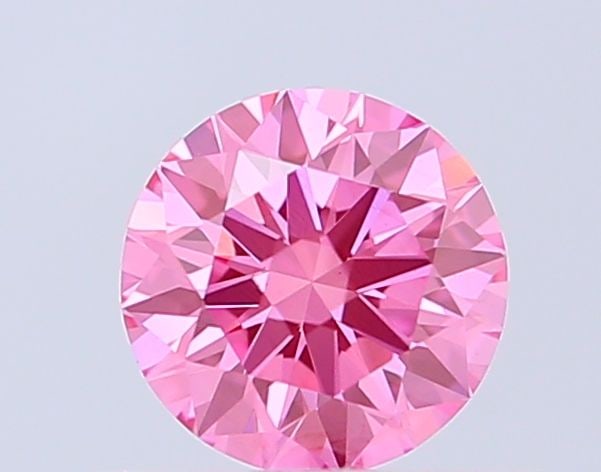 Loose Diamond - ROUND 0.55ct Fancy Vivid Pink VS1: Loose Diamond - ROUND 0.55ct Fancy Vivid Pink VS1 Source: This is a real non-mined Diamond that has been grown in a lab Shape: ROUND Carats: 0.55 Color: Fancy Vivid Pink Certification: IGI Video:
