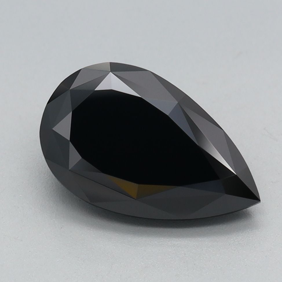 Loose Diamond - PEAR 1.57ct Fancy Black: Loose Diamond - PEAR 1.57ct Fancy Black Source: This is a real non-mined Diamond that has been grown in a lab Shape: PEAR Carats: 1.57 Color: Fancy Black Certification: IGI Video: