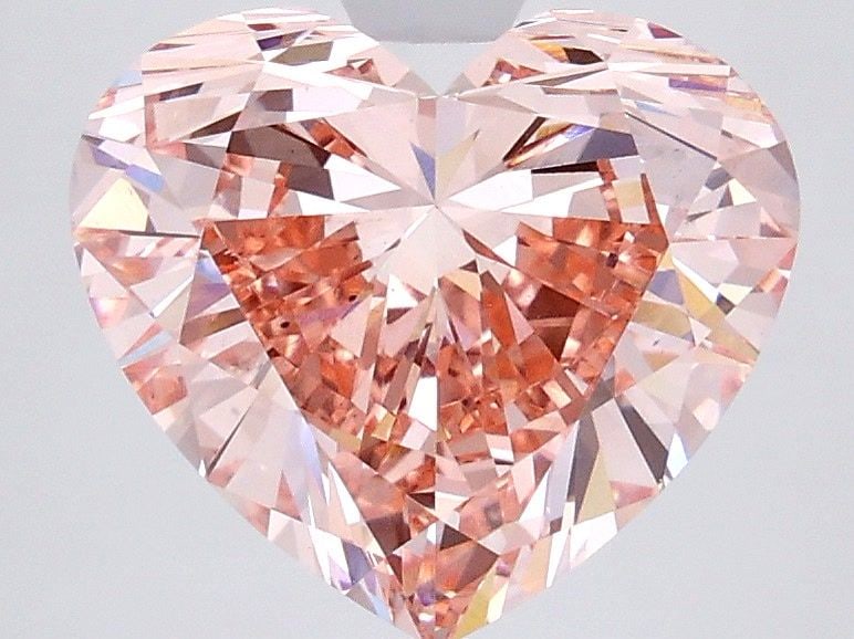 Loose Diamond - HEART 4.5ct Fancy Vivid Pink VS1: Loose Diamond - HEART 4.5ct Fancy Vivid Pink VS1 Source: This is a real non-mined Diamond that has been grown in a lab Shape: HEART Carats: 4.5 Color: Fancy Vivid Pink Certification: IGI Video: