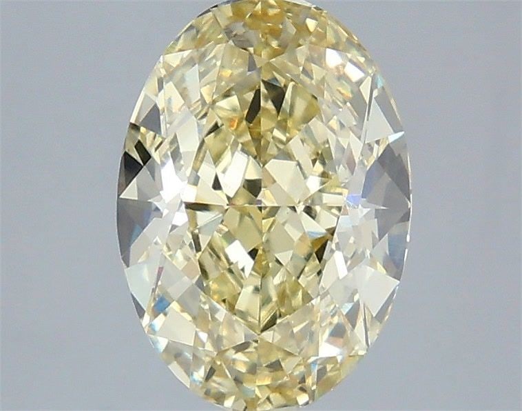 Loose Diamond - OVAL 2.81ct Fancy Light Yellow VVS2: Loose Diamond - OVAL 2.81ct Fancy Light Yellow VVS2 Source: This is a real non-mined Diamond that has been grown in a lab Shape: OVAL Carats: 2.81 Color: Fancy Light Yellow Certification: IGI Video: