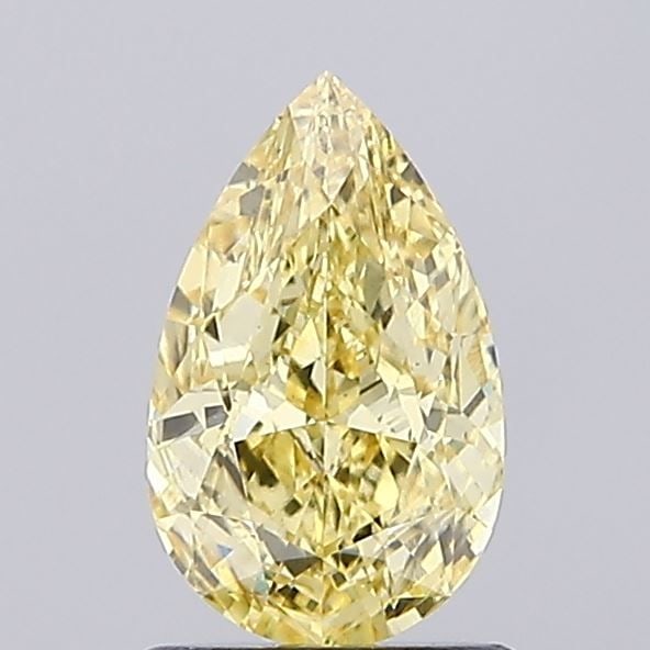 Loose Diamond - PEAR 1.2ct Fancy Vivid Yellow VS2: Loose Diamond - PEAR 1.2ct Fancy Vivid Yellow VS2 Source: This is a real non-mined Diamond that has been grown in a lab Shape: PEAR Carats: 1.2 Color: Fancy Vivid Yellow Certification: IGI Video: