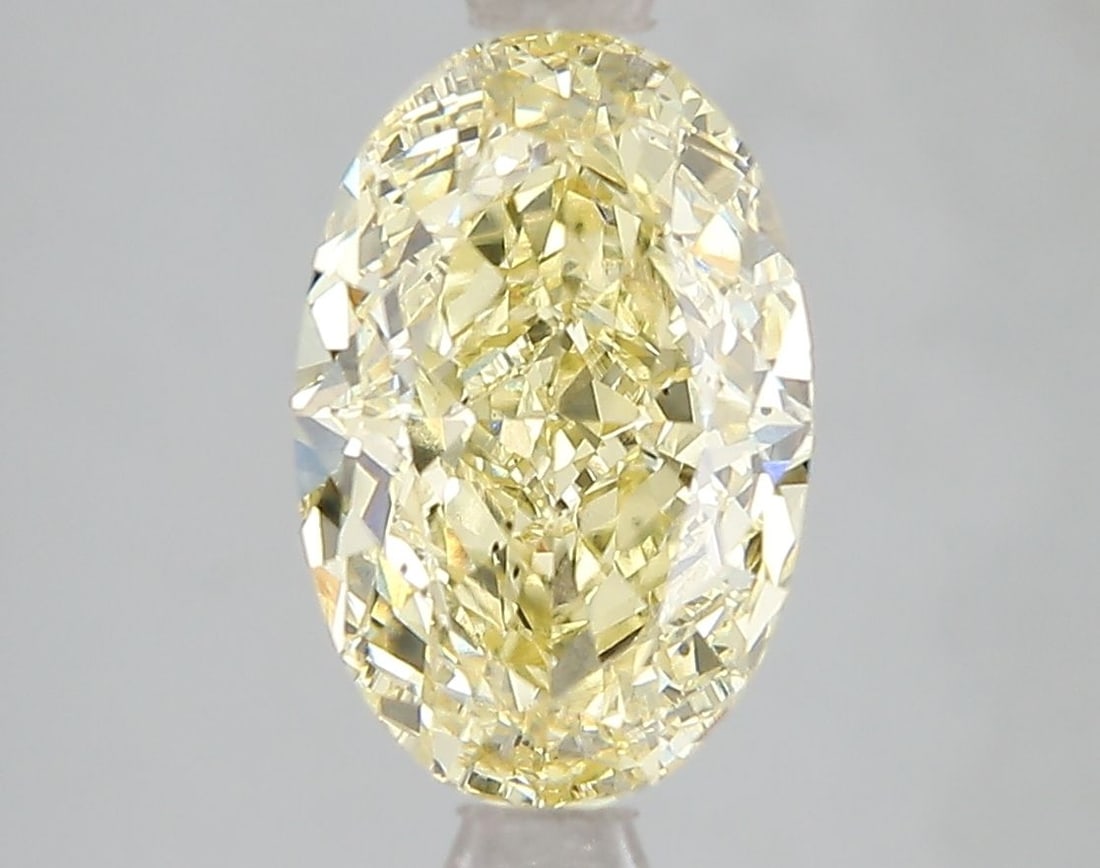 Loose Diamond - OVAL 3.06ct Fancy Intense Yellow VS2: Loose Diamond - OVAL 3.06ct Fancy Intense Yellow VS2 Source: This is a real non-mined Diamond that has been grown in a lab Shape: OVAL Carats: 3.06 Color: Fancy Intense Yellow Certification: IGI Video