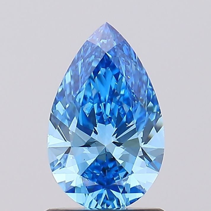 Loose Diamond - PEAR 1.0ct Fancy Vivid Blue VS2: Loose Diamond - PEAR 1.0ct Fancy Vivid Blue VS2 Source: This is a real non-mined Diamond that has been grown in a lab Shape: PEAR Carats: 1.0 Color: Fancy Vivid Blue Certification: IGI Video: