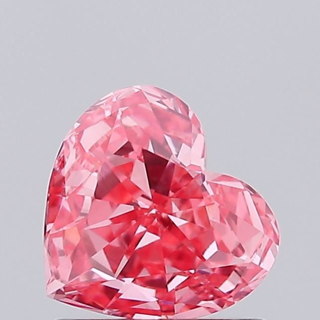 Loose Diamond - HEART 0.83ct Fancy Vivid Pink VVS2: Loose Diamond - HEART 0.83ct Fancy Vivid Pink VVS2 Source: This is a real non-mined Diamond that has been grown in a lab Shape: HEART Carats: 0.83 Color: Fancy Vivid Pink Certification: IGI Video: