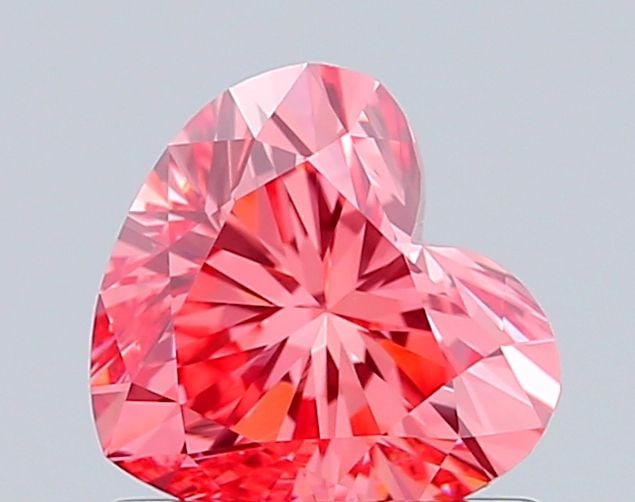 Loose Diamond - HEART 0.91ct Fancy Vivid Pink VVS2: Loose Diamond - HEART 0.91ct Fancy Vivid Pink VVS2 Source: This is a real non-mined Diamond that has been grown in a lab Shape: HEART Carats: 0.91 Color: Fancy Vivid Pink Certification: IGI Video:
