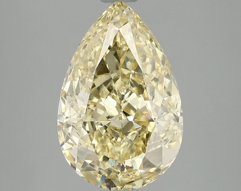 Loose Diamond - PEAR 2.92ct Fancy Vivid Yellow VS1: Loose Diamond - PEAR 2.92ct Fancy Vivid Yellow VS1 Source: This is a real non-mined Diamond that has been grown in a lab Shape: PEAR Carats: 2.92 Color: Fancy Vivid Yellow Certification: IGI Video: