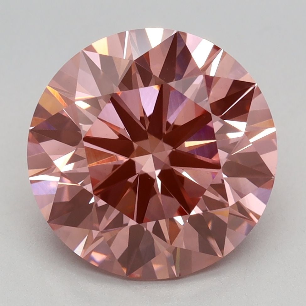 Ideal Loose Diamond - ROUND 3.09ct Fancy Vivid Pink VVS2: Ideal Loose Diamond - ROUND 3.09ct Fancy Vivid Pink VVS2 Source: This is a real non-mined Diamond that has been grown in a lab Shape: ROUND Carats: 3.09 Color: Fancy Vivid Pink Certification: IGI Vide