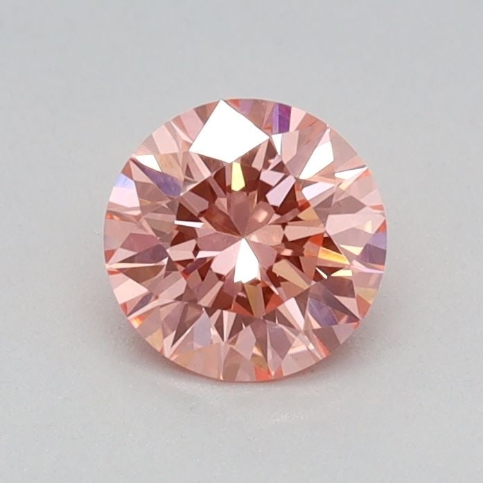 Loose Diamond - ROUND 0.44ct Fancy Vivid Pink VVS2: Loose Diamond - ROUND 0.44ct Fancy Vivid Pink VVS2 Source: This is a real non-mined Diamond that has been grown in a lab Shape: ROUND Carats: 0.44 Color: Fancy Vivid Pink Certification: IGI Video: