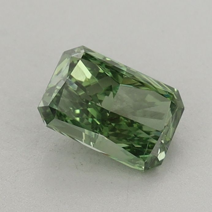 Loose Diamond - RADIANT 0.73ct Fancy Vivid Green VS2: Loose Diamond - RADIANT 0.73ct Fancy Vivid Green VS2 Source: This is a real non-mined Diamond that has been grown in a lab Shape: RADIANT Carats: 0.73 Color: Fancy Vivid Green Certification: IGI Video