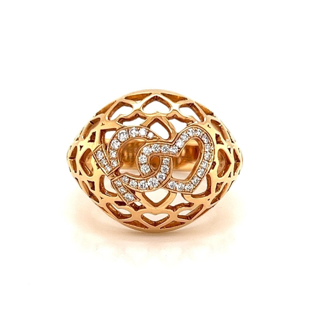 Dome Style Open Hearts Ring 18k Rose Gold Diamond Omega Size 7: Dome Style Open Hearts Ring 18k Rose Gold Diamond Omega Size 7 This Omega dome ring features open heart motifs crafted in 18k rose gold, set with a central diamond totaling 0.42ct. The piece is signed