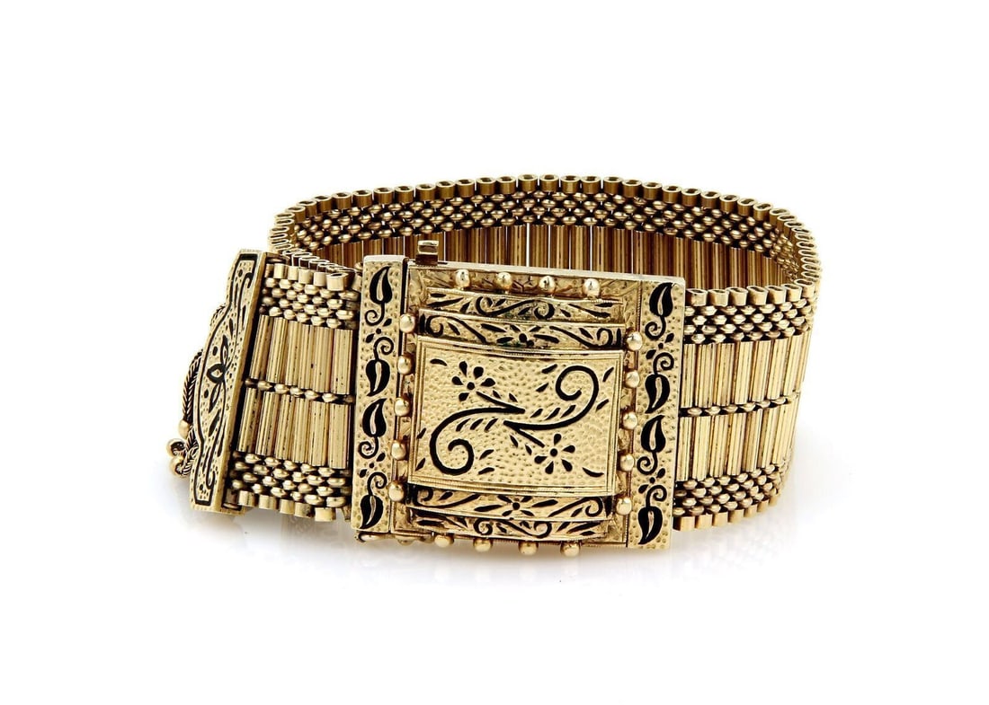 14k Gold Enamel Wrap Bracelet with Hidden Geneva Watch Buckle Tassel Design: 14k Gold Enamel Wrap Bracelet with Hidden Geneva Watch Buckle Tassel Design This retro wrap-style bracelet features a unique hidden Geneva watch design integrated into the buckle tassel. Crafted from
