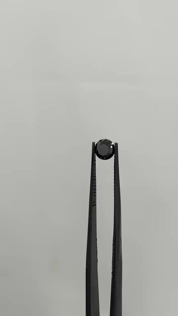 Loose Diamond - ROUND 0.72ct Fancy Black VVS2: Loose Diamond - ROUND 0.72ct Fancy Black VVS2 Source: Natural Shape: ROUND Carats: 0.72 Color: Fancy Black Certification: GIA Video: