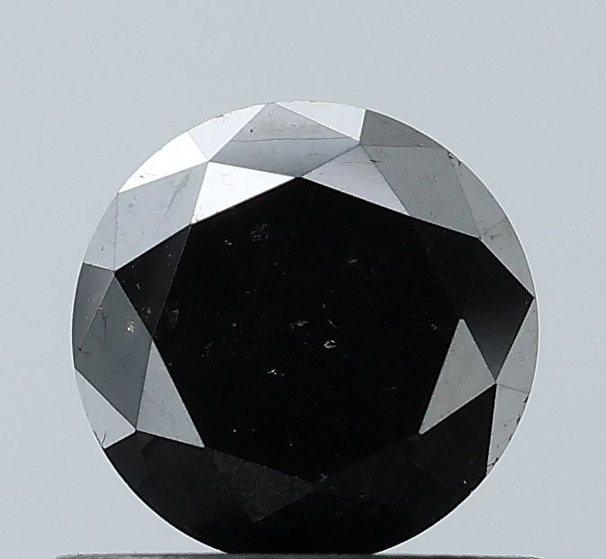Loose Diamond - ROUND 0.85ct Fancy Black VVS2: Loose Diamond - ROUND 0.85ct Fancy Black VVS2 Source: Natural Shape: ROUND Carats: 0.85 Color: Fancy Black Certification: NONE Video: