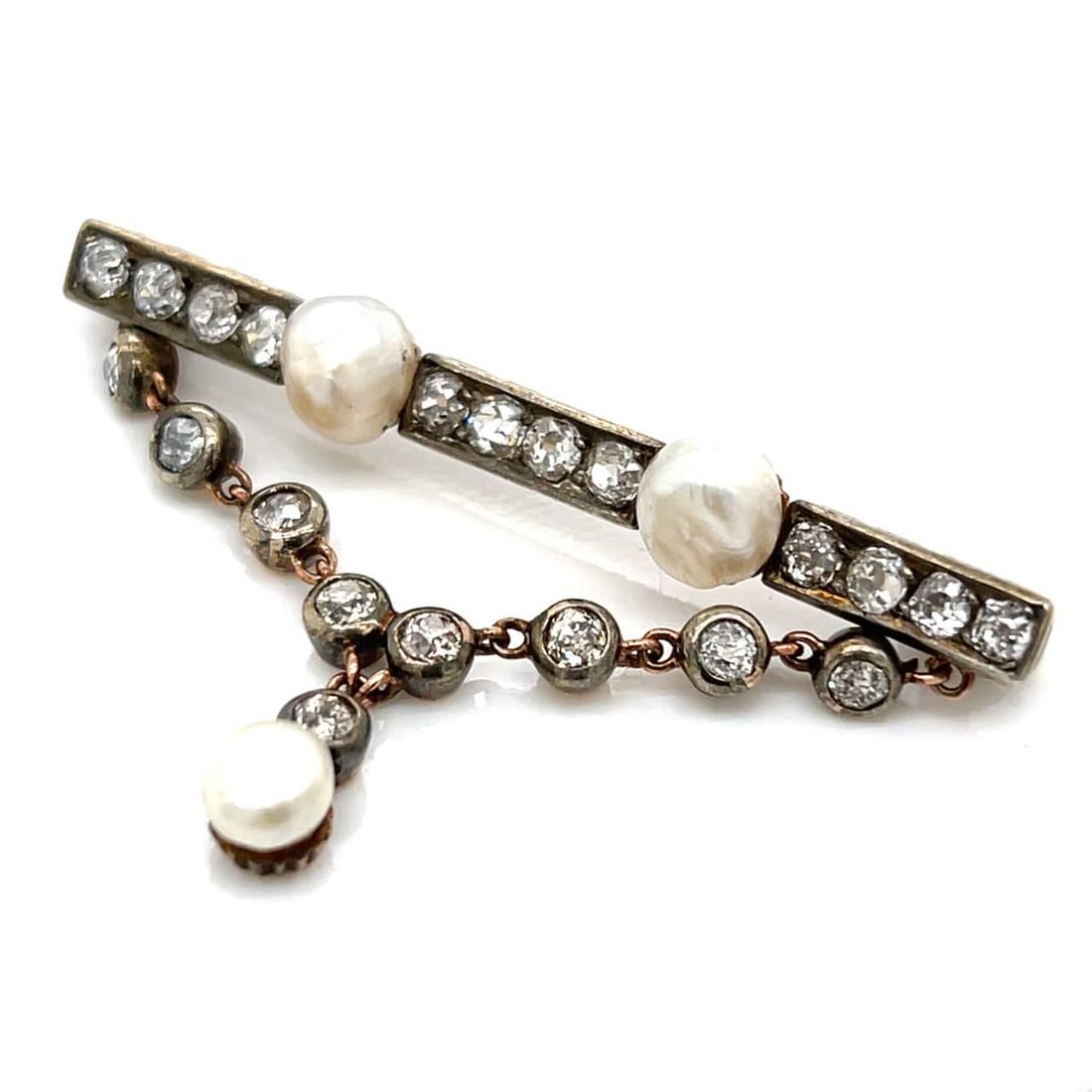 Victorian 18K Gold Silver Top Pearl Diamond Brooch 2 Inch: Victorian 18K Gold Silver Top Pearl Diamond Brooch 2 Inch This exquisite Victorian brooch features a stunning blend of 18K gold and a silver top, showcasing three natural pearls complemented by 21 old