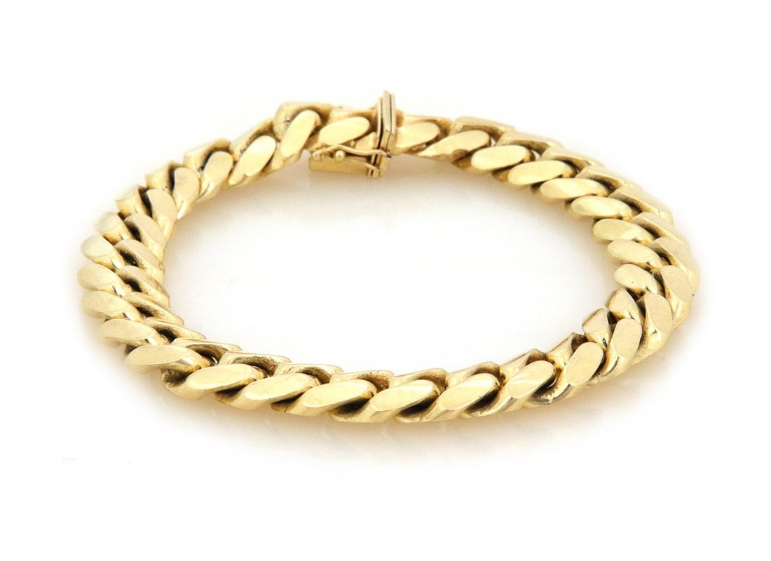 Men's 14k Yellow Gold 11.5mm Curb Link Bracelet 92g Secure Clasp: Men's 14k Yellow Gold 11.5mm Curb Link Bracelet 92g Secure Clasp This elegant men's curb link bracelet is crafted from solid 14k yellow gold, showcasing a width of 11.5mm and a smooth flat top on both