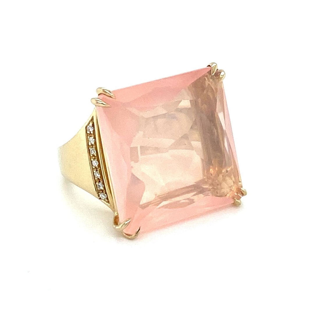Square Pink Quartz Diamond Accent Ring in 18k Gold Size 6: Square Pink Quartz Diamond Accent Ring in 18k Gold Size 6 This vintage ring features a large square-cut pink quartz stone accented with a 10-point diamond, set in an 18k yellow gold setting. Designed
