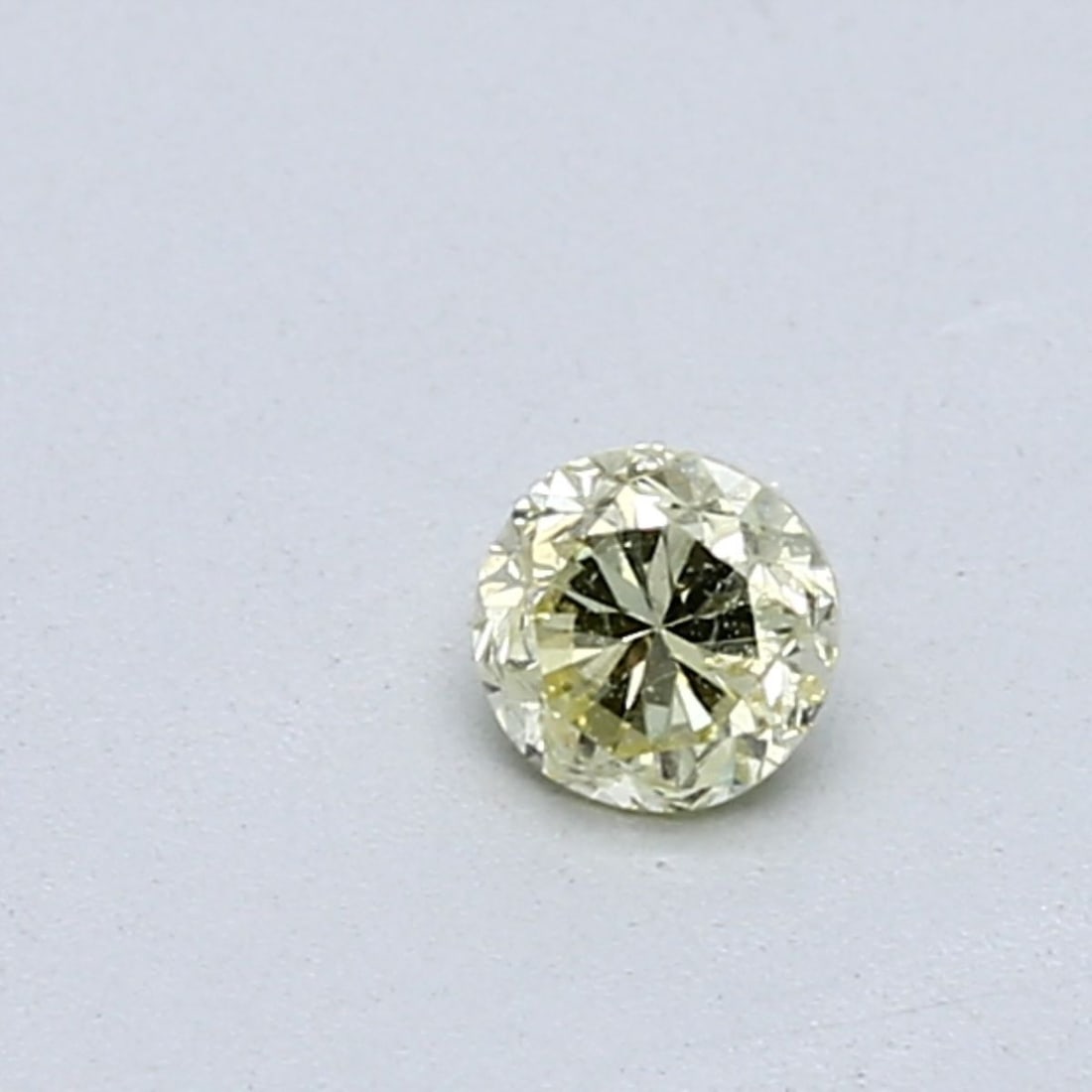 Loose Diamond - ROUND 0.22ct Fancy Light Yellow SI2: Loose Diamond - ROUND 0.22ct Fancy Light Yellow SI2 Source: Natural Shape: ROUND Carats: 0.22 Color: Fancy Light Yellow Certification: GIA Video: