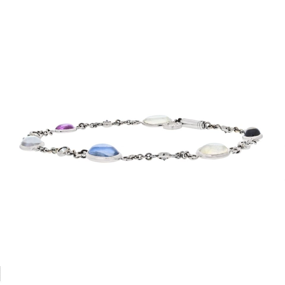 Bvlgari 18K White Gold Parentesi Gemstone Diamond Bracelet: Bvlgari 18K White Gold Parentesi Gemstone Diamond Bracelet This exquisite Bvlgari chain bracelet features a stunning combination of gemstones and diamonds, beautifully crafted in 18K white gold. Part